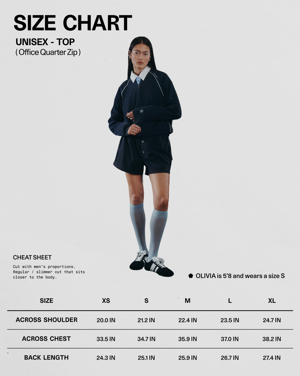Size chart for a unisex office quarter zip top with a model wearing the garment.