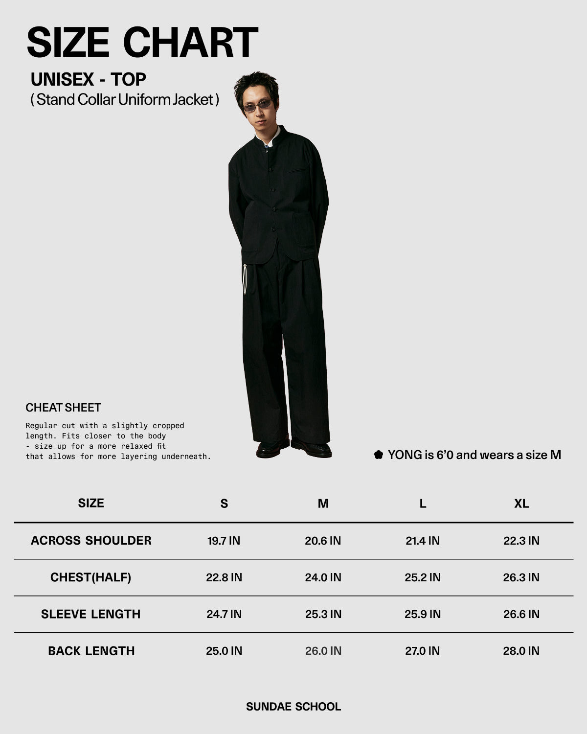 A person wears the Sundae School BLACK STAND COLLAR UNIFORM JACKET with wide-leg pants, posing against a plain background. Below is a size chart for this unisex top in S, M, L, and XL. The 6'0" model wears size M.
