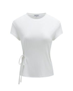 The IVORY ORIGAMI GORUM TEE by Sundae School is a white, short-sleeve fitted t-shirt featuring a round neckline and a thin side tie detail on the left, displayed against a plain white background.
