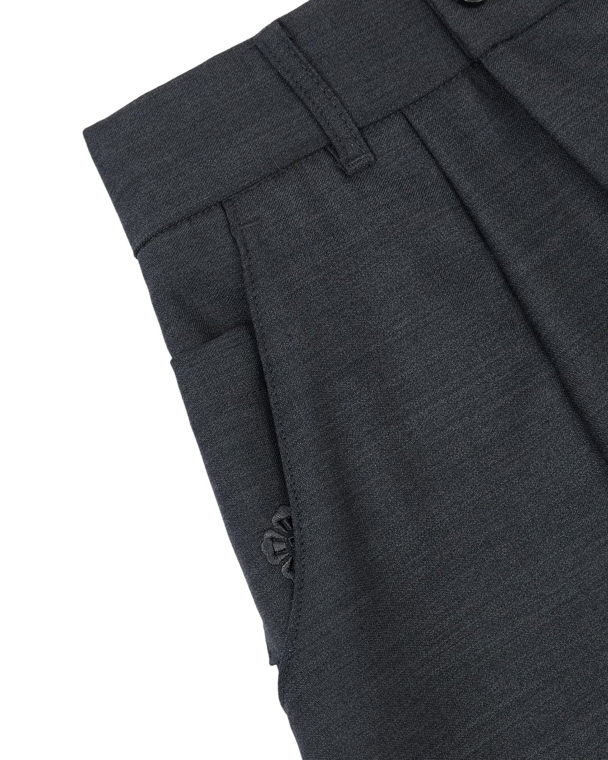 Close-up of the upper part of Sundae School CHARCOAL PLEATED HANBOK SLACKS, featuring a waistband with belt loops, pleats, and a partially visible side pocket.
