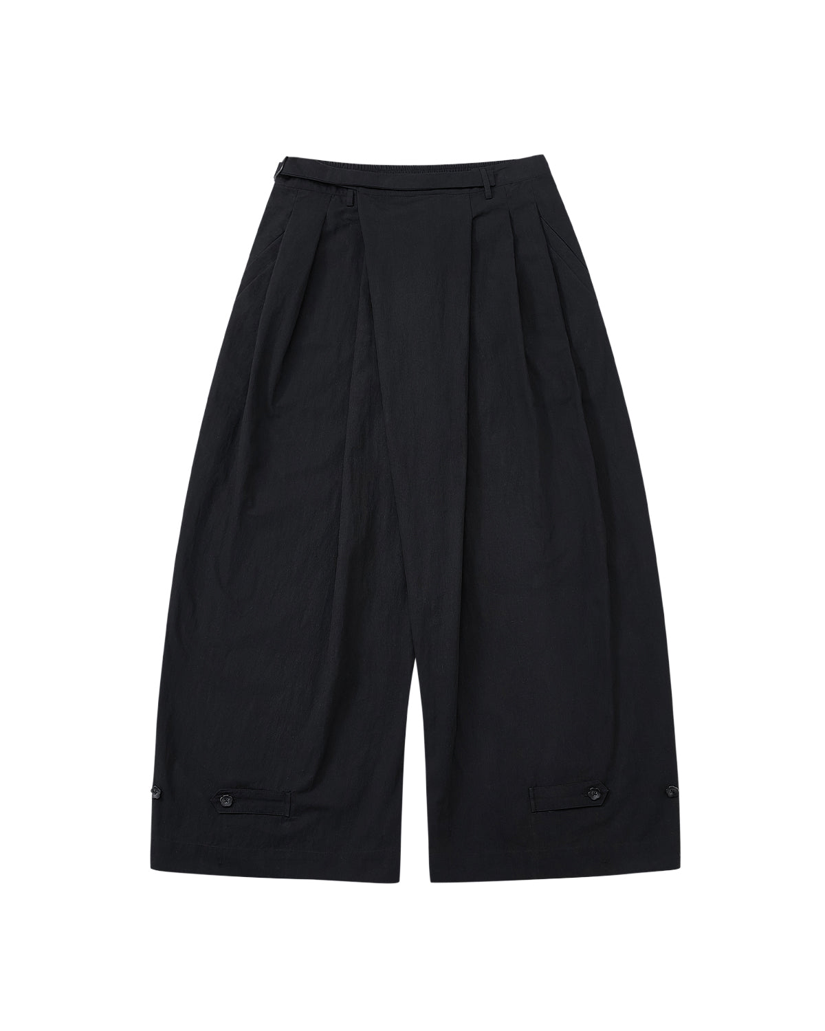 Sundae School’s BLACK PLEATED PALAZZO PANTS feature wide legs, pleats at the waist, a high waistband, mochi button details near the hem, and a mid-calf length. Shown on a light gray background.