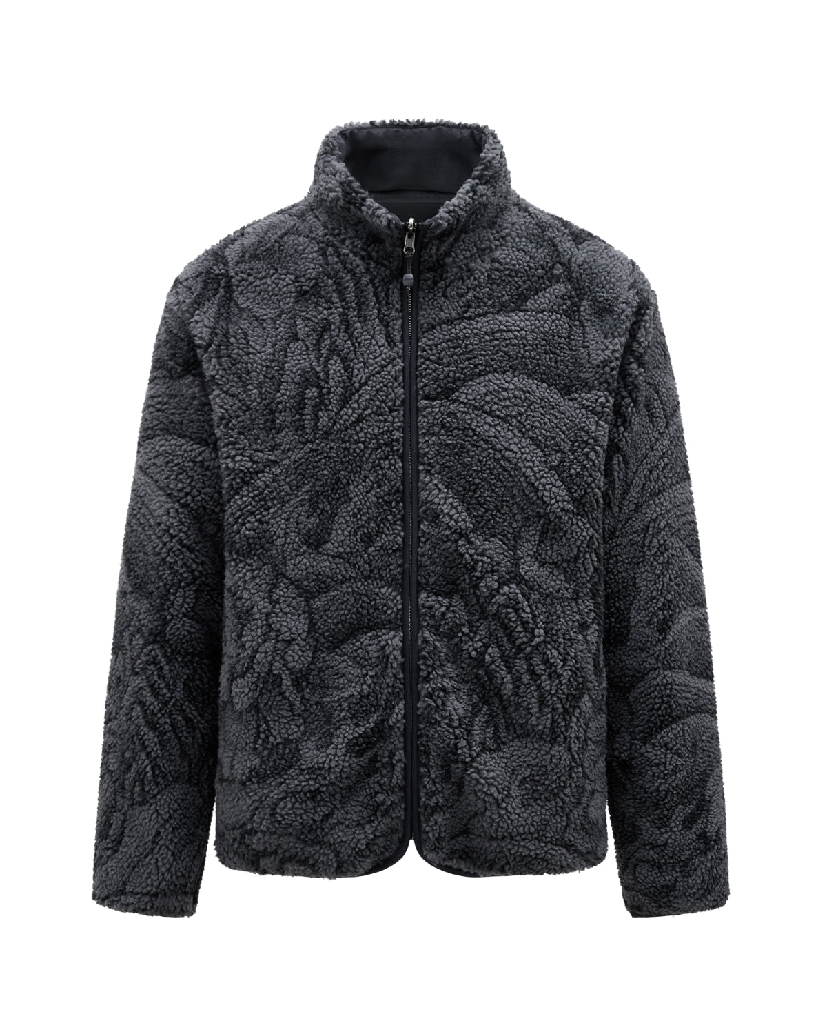 The BLACK REVERSIBLE IREZUMI FLEECE by Sundae School is a dark gray jacquard fleece jacket featuring a high collar, full front zipper, and textured pattern. It has long sleeves, a cozy plush appearance, and is accented with subtle tiger and dragon graphics for added style.