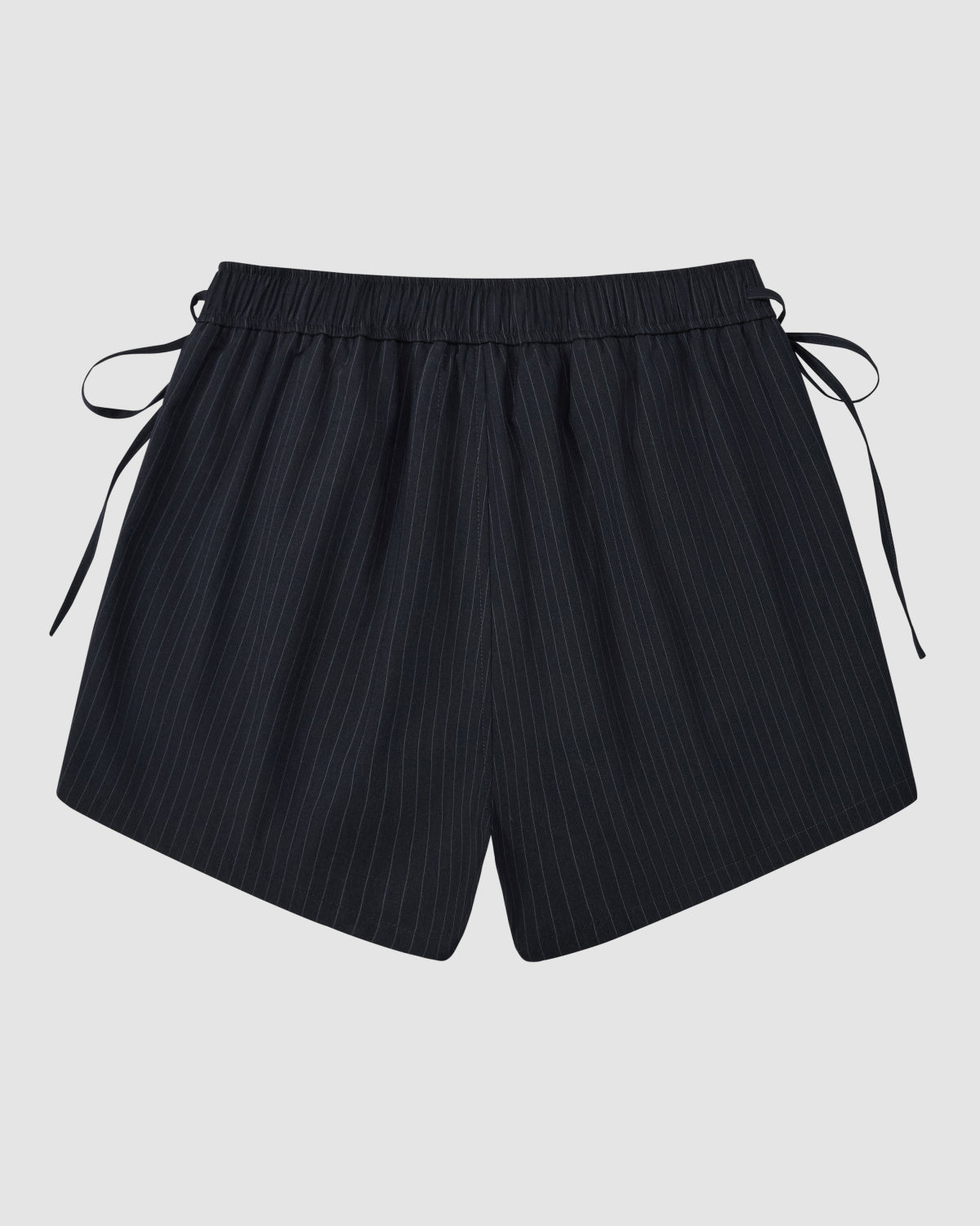Sundae School's NAVY STRIPE BOXER SHORTS, made from a soft Tencel-rayon blend with an elastic waistband and side ties, are shown against a plain light gray background.