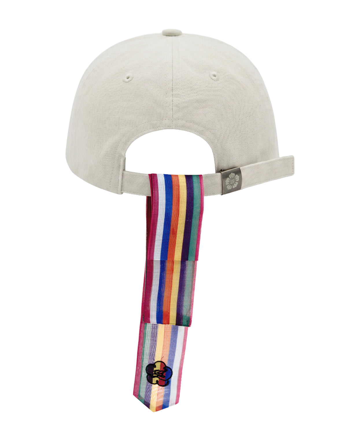 The IVORY DAENGGI CAP by Sundae School is an adjustable cotton cap in beige, featuring a rainbow-striped tie attached to the back strap and accented with a small flower patch near the end—a standout accessory for any Sundae School cap enthusiast.