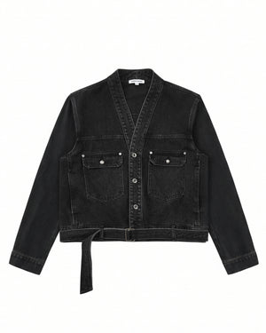 The BLACK WIDOW TAEKWONDO DENIM JACKET by Sundae School—a black, collarless V-neck denim jacket featuring a button front, double-buckle belt at the waist, and two flap chest pockets—offers a modern twist on the Korean Canadian tuxedo, shown here laid flat on a white background.