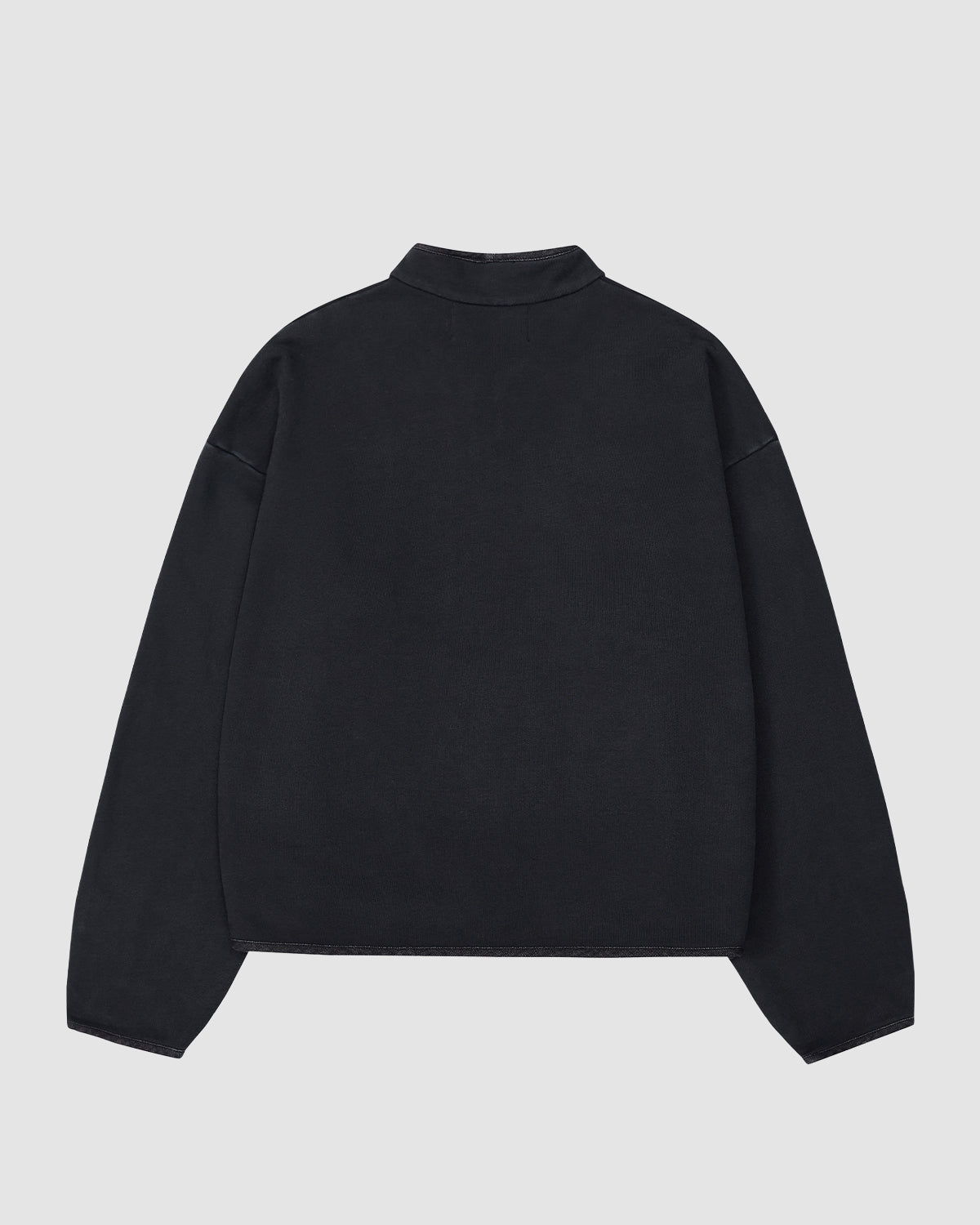 The BLACK TEARDROP KNOT SWEATSHIRT by Sundae School is displayed laid flat, back facing up on a light gray background. It features a simple design with a high collar and loose sleeves.