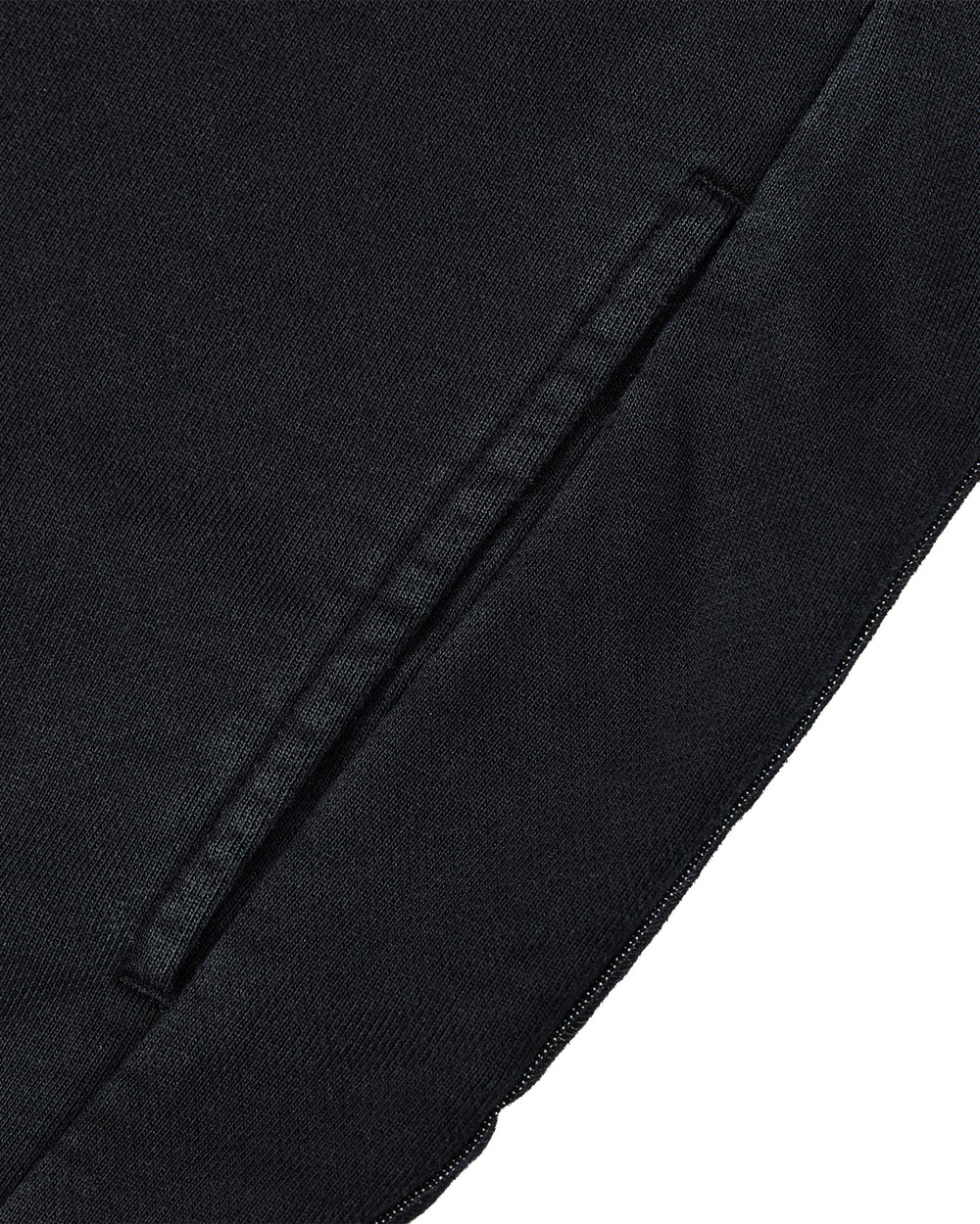 Close-up of the BLACK TEARDROP KNOT SWEATSHIRT by Sundae School, crafted from 100% cotton, featuring a side pocket with a visible seam and detailed stitching.