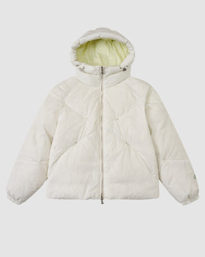 The Sundae School IVORY LIME ORIGAMI PUFFER is a white quilted jacket with a relaxed fit, hood lined in light yellow, front zipper, and elastic cuffs, shown against a plain white background.